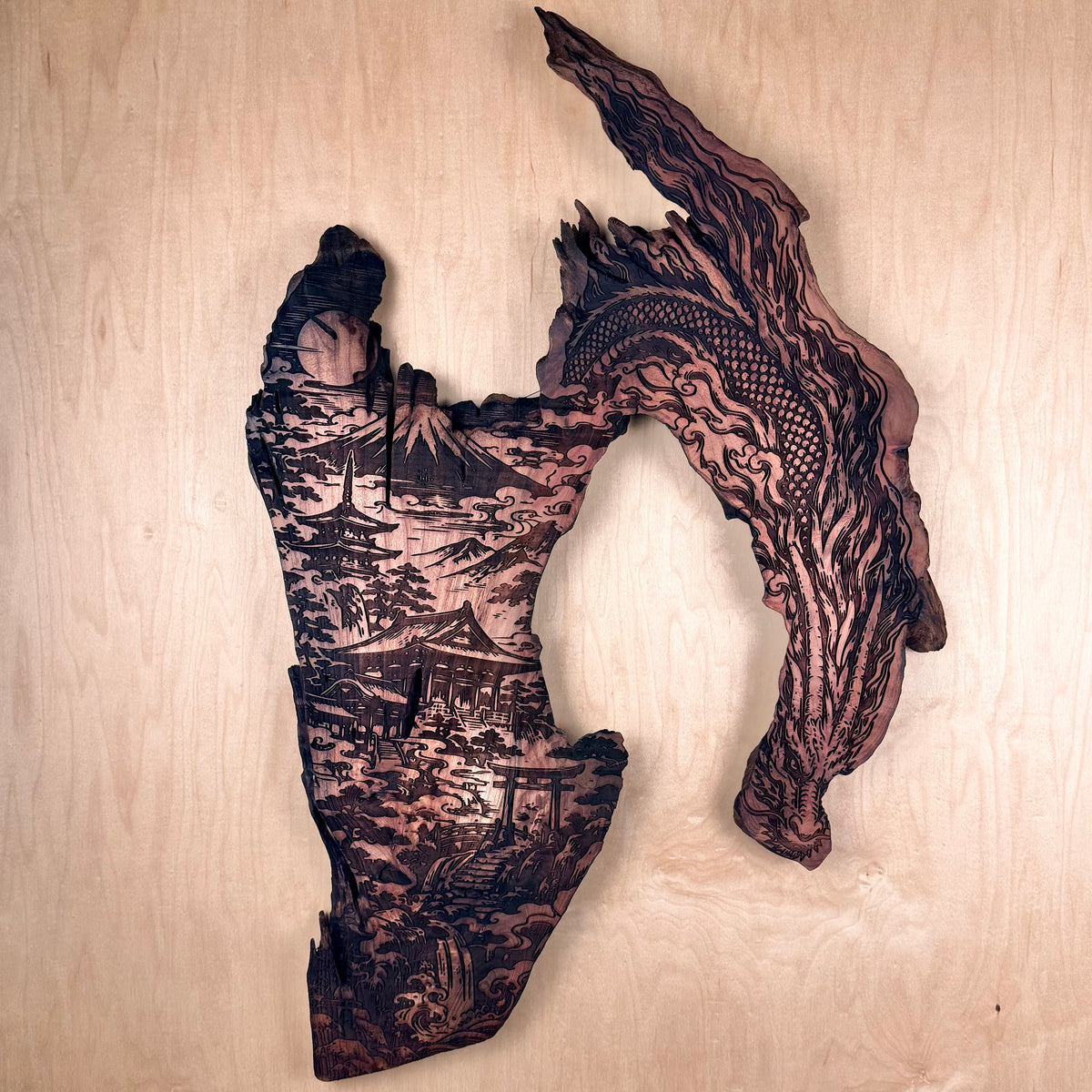 Natural wood wall art featuring a Japanese landscape scene with Mount Fuji, torii gates, and a dragon motif measures @ 18" x 29" engraved on California redwood.